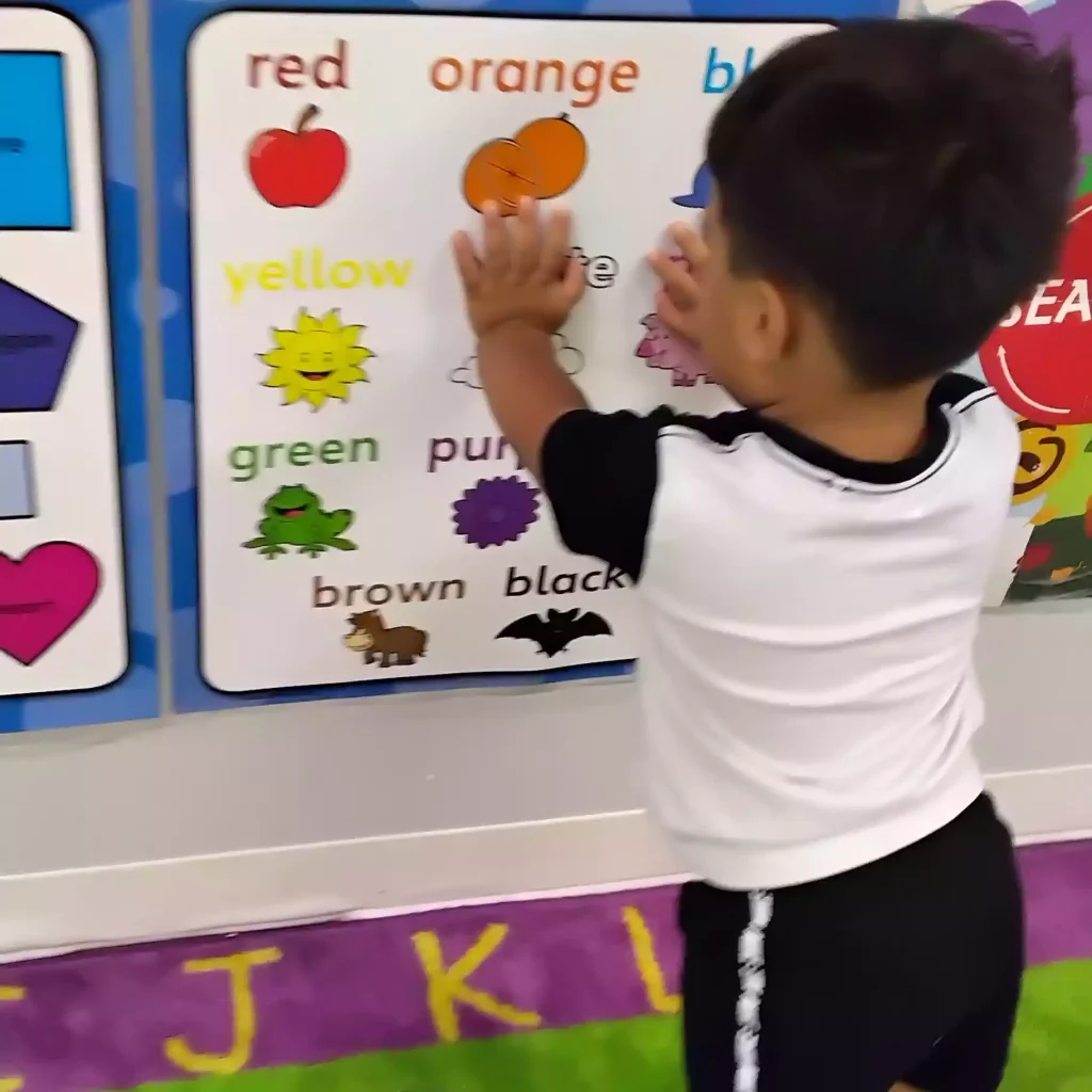 Pinebrook Montessori student exploring classroom color chart